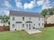 This house boasts a big backyard with a spacious patio, perfect for outdoor gatherings at 7104 Secret Rose, Douglasville, GA 30134