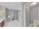 A bathroom featuring a dual sink vanity, soaking tub and shower at 7104 Secret Rose, Douglasville, GA 30134