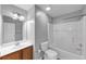 Clean bathroom with neutral paint, combined shower and tub and functional fixtures at 7104 Secret Rose, Douglasville, GA 30134