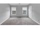 Bedroom offers carpet, neutral walls, and natural light, providing a comfortable and inviting atmosphere at 7104 Secret Rose, Douglasville, GA 30134