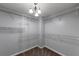 Large, unfinished walk-in closet with extensive shelving at 7104 Secret Rose, Douglasville, GA 30134
