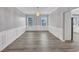 Dining room with decorative molding and modern chandelier at 7104 Secret Rose, Douglasville, GA 30134