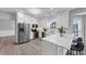 Kitchen with stainless steel appliances and marble countertops at 7104 Secret Rose, Douglasville, GA 30134