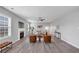 Spacious living room with fireplace, wood floors, neutral paint, modern furniture and lots of natural light at 7104 Secret Rose, Douglasville, GA 30134