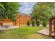 Backyard featuring a fire pit, stone benches, and green lawn at 937 Rosedale Ne Rd, Atlanta, GA 30306