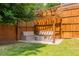 Backyard with a pergola over a fire pit and built-in seating at 937 Rosedale Ne Rd, Atlanta, GA 30306