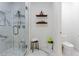 Beautiful bathroom with a walk-in shower, marble floors, and decorative shelves that offer a modern feel at 937 Rosedale Ne Rd, Atlanta, GA 30306