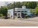 Commercial building exterior with outdoor seating, featuring black and white awnings at 937 Rosedale Ne Rd, Atlanta, GA 30306
