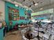 Interior of a cafe with art on the walls, cozy seating, and plenty of natural light at 937 Rosedale Ne Rd, Atlanta, GA 30306