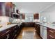 Kitchen with a center island, stainless steel appliances, and dark cabinets at 937 Rosedale Ne Rd, Atlanta, GA 30306