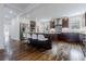 Open island kitchen with stainless steel appliances, dark wood cabinetry and hardwood floors at 937 Rosedale Ne Rd, Atlanta, GA 30306