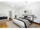 Bright main bedroom with hardwood floors and a walk-in closet and ensuite bathroom at 937 Rosedale Ne Rd, Atlanta, GA 30306