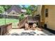 Spacious back deck with comfortable seating and a view of the landscaped backyard at 34 Laurel Ne Way, White, GA 30184
