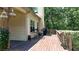 Back deck with ample seating, ideal for outdoor dining and relaxation at 34 Laurel Ne Way, White, GA 30184