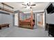Unique bedroom with rustic wood frame bed and hanging decor at 34 Laurel Ne Way, White, GA 30184