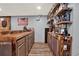 Finished basement bar area featuring a custom-built bar and plenty of shelving at 34 Laurel Ne Way, White, GA 30184