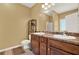 Bathroom with dual sink vanity, tile floors, and neutral walls at 34 Laurel Ne Way, White, GA 30184