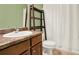 Bathroom with a single vanity and a shower/tub combo at 34 Laurel Ne Way, White, GA 30184