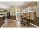 Inviting dining area with hardwood floors and a door that leads to the backyard at 34 Laurel Ne Way, White, GA 30184