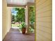 Inviting front porch featuring wooden floors and views of lush greenery at 34 Laurel Ne Way, White, GA 30184