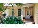 Charming front porch with beautiful hydrangeas and inviting entrance to the lovely home at 34 Laurel Ne Way, White, GA 30184