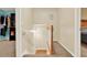 Hallway featuring hardwood and carpeted flooring, and a staircase at 34 Laurel Ne Way, White, GA 30184