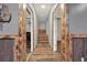 Inviting hallway with wooden accents and multiple entry points at 34 Laurel Ne Way, White, GA 30184
