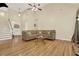 Spacious living room with high ceilings, wood floors and comfortable seating at 34 Laurel Ne Way, White, GA 30184