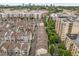 Scenic aerial view of a neighborhood with townhomes and high-rise buildings at 635 Broadview Ne Pl, Atlanta, GA 30324