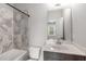 Modern bathroom with a tiled shower and vanity sink at 635 Broadview Ne Pl, Atlanta, GA 30324