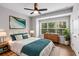 Comfortable bedroom with a window and a ceiling fan at 635 Broadview Ne Pl, Atlanta, GA 30324