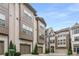 Beautiful townhome exteriors with brick and bay window designs at 635 Broadview Ne Pl, Atlanta, GA 30324