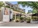 Exterior showcases retail spaces with awnings and landscaped planters, creating a luxurious shopping experience in the Buckhead area at 635 Broadview Ne Pl, Atlanta, GA 30324
