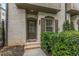 Close up of the front entrance with brick steps and lovely landscaping at 635 Broadview Ne Pl, Atlanta, GA 30324