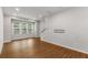 Comfortable living room with wood floors and natural light at 635 Broadview Ne Pl, Atlanta, GA 30324