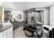 A luxurious bathroom featuring modern fixtures, stylish vanities and a separate shower at 8610 Sentinae Chase Dr, Roswell, GA 30076