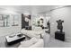 Stylish living room with a modern sofa, contemporary art, and an open layout at 8610 Sentinae Chase Dr, Roswell, GA 30076