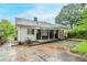 Backyard with screened in porch and exterior view of home at 1615 Stokes Sw Ave, Atlanta, GA 30310