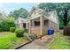 Brick home with front porch and a long driveway at 1615 Stokes Sw Ave, Atlanta, GA 30310