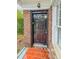 A black front door at 1615 Stokes Sw Ave, Atlanta, GA 30310