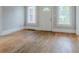 A vacant room with hard wood floors and neutral paint at 1615 Stokes Sw Ave, Atlanta, GA 30310