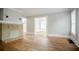 Living room boasting hardwood floors, a fireplace and an open floor plan at 1615 Stokes Sw Ave, Atlanta, GA 30310