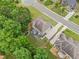An aerial view of the property showing the home's backyard and neighborhood at 1898 Alcovy Shoals Se Blf, Lawrenceville, GA 30045