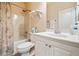 Cozy bathroom featuring a shower-tub, single sink vanity, and a neutral color palette at 1898 Alcovy Shoals Se Blf, Lawrenceville, GA 30045