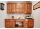 Well-appointed home office with custom cabinetry, granite countertops, and natural lighting at 1898 Alcovy Shoals Se Blf, Lawrenceville, GA 30045