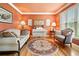 Cozy living room with a decorative rug and comfortable seating at 1898 Alcovy Shoals Se Blf, Lawrenceville, GA 30045