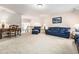 Upstairs living room with comfortable seating and stylish décor, bathed in natural light at 1898 Alcovy Shoals Se Blf, Lawrenceville, GA 30045