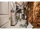 Utility room featuring exposed ductwork and the home's furnace at 1898 Alcovy Shoals Se Blf, Lawrenceville, GA 30045