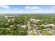 Aerial view of the community and its neighborhood featuring tree-lined streets and neighborhood buildings at 270 Park Bridge Ln, Roswell, GA 30075
