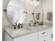 Bright bathroom boasts double sinks, granite counters, and modern fixtures with views to the tiled shower at 270 Park Bridge Ln, Roswell, GA 30075